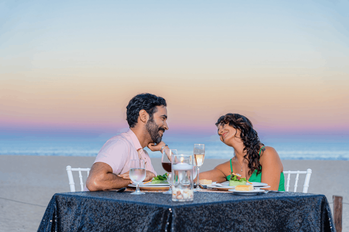 Oceanfront dinner at Krystal Grand Los Cabos with a romantic beach setting and Sea of Cortes views.