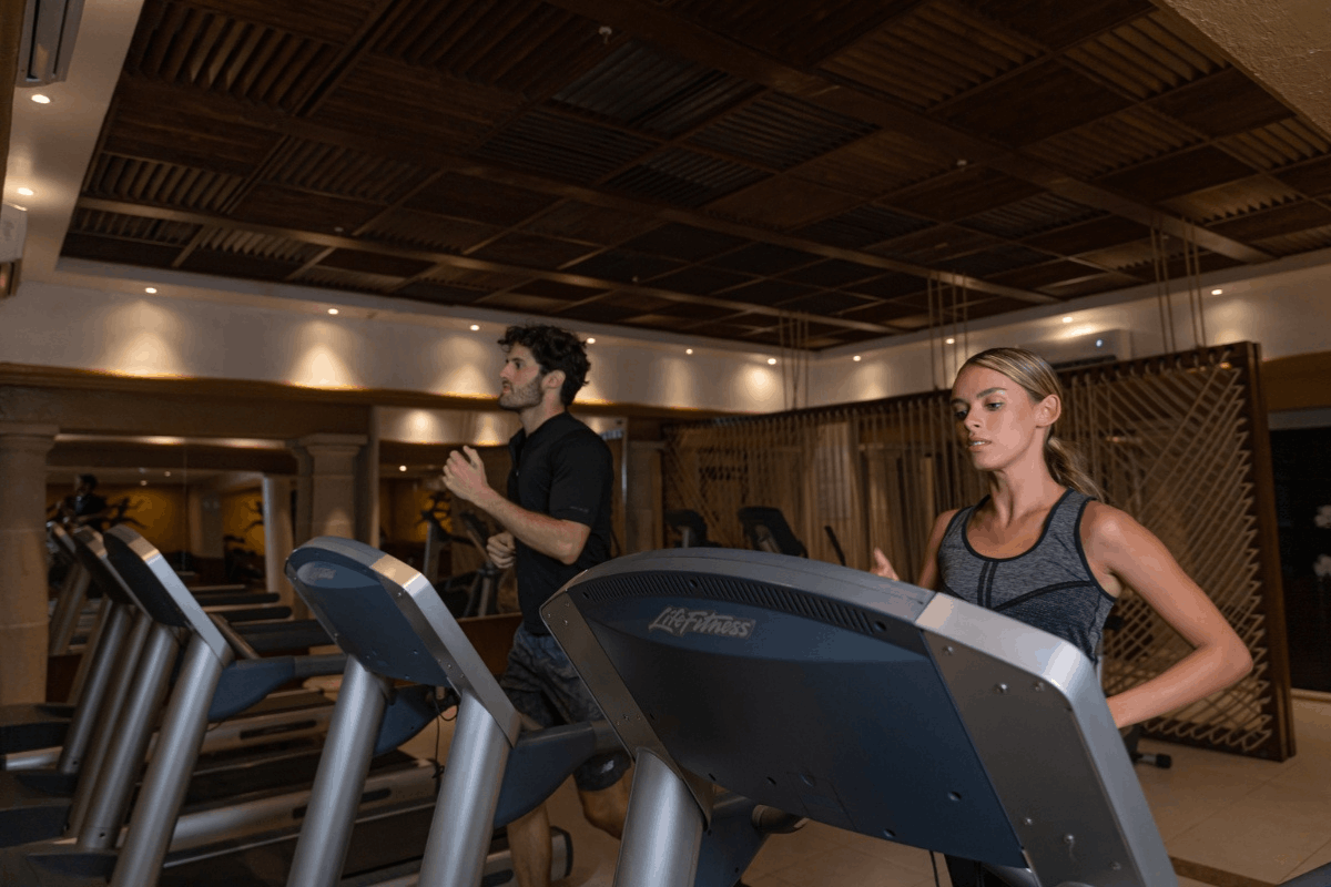 Fitness center at Krystal Grand Los Cabos with treadmills, training equipment and workout space for guests.